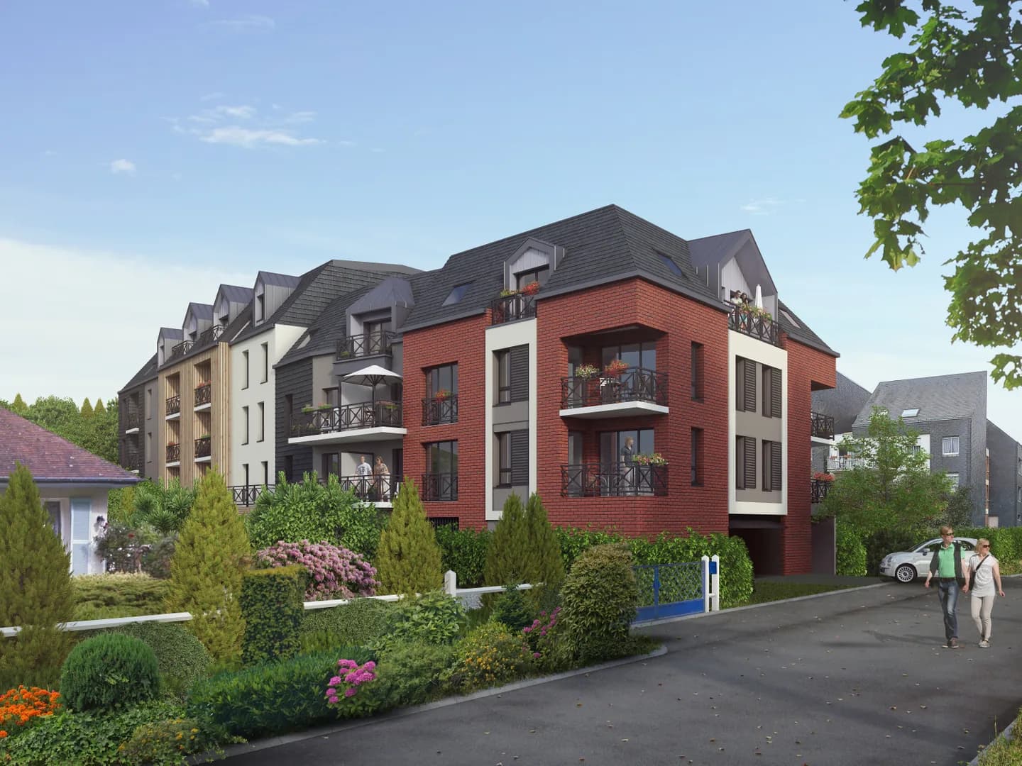 Boréal à Honfleur : résidence neuve en brique et ardoise, balcons et lucarnes, jardins fleuris le long de l'allée